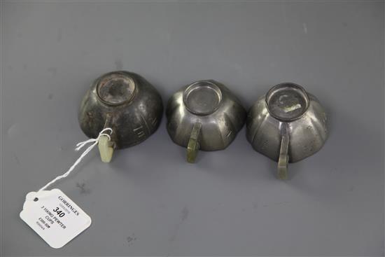 Three Chinese Yixing pewter and jade mounted cups, Daoguang period (1821-50), w. 8cm-8.6cm